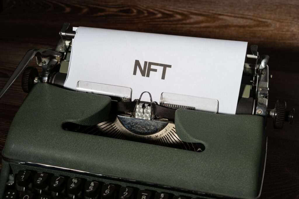 pexelsphoto12188470 The Local Marketer nft word on a paper use nfts to grow your business