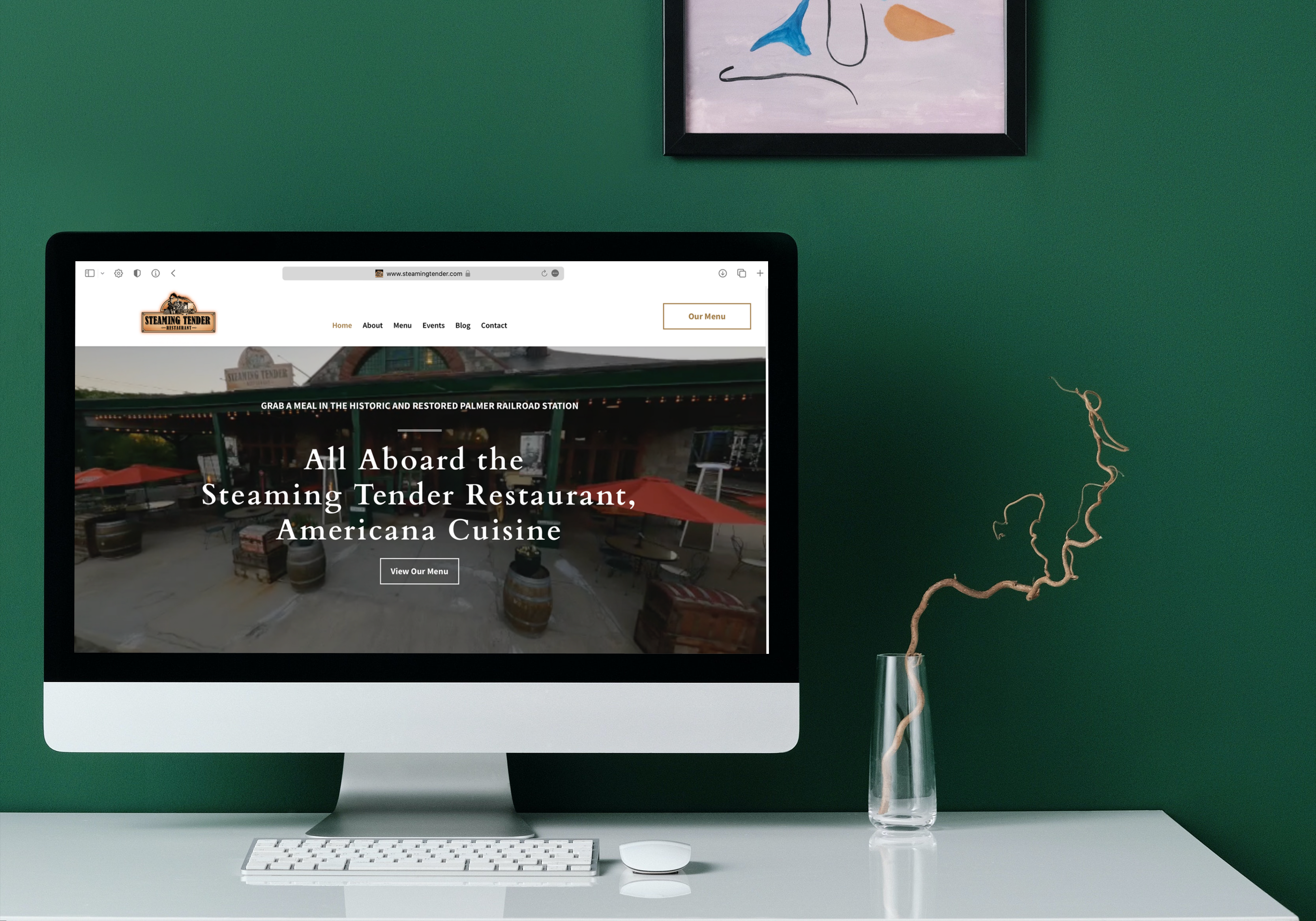 Graphic of an iMac on a desk with Steaming Tenders website loaded